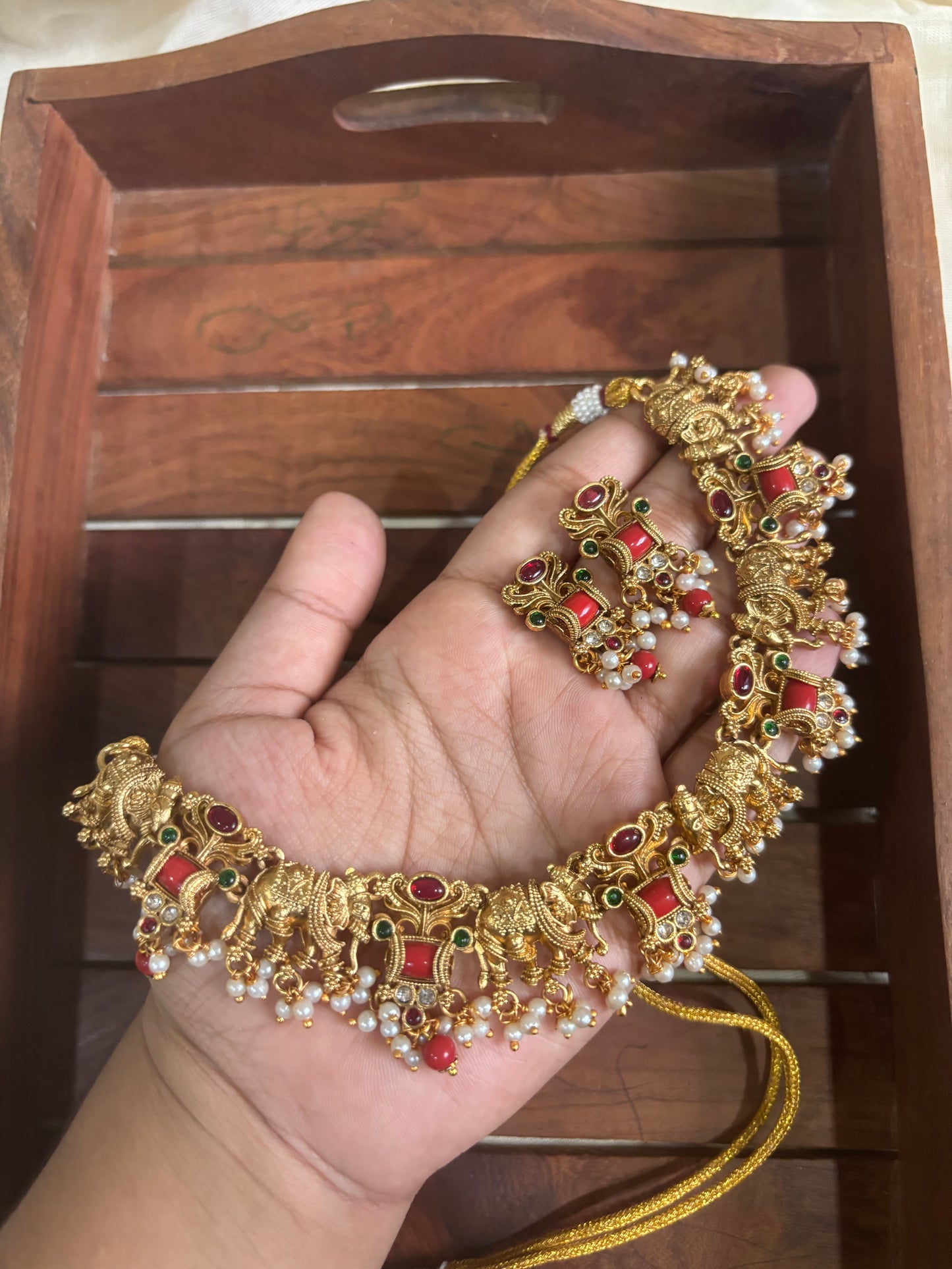 Coral elephant necklace