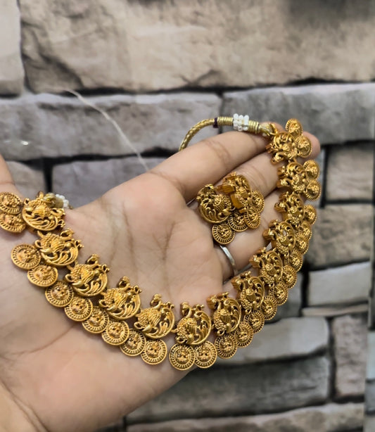 Gold peacock necklace