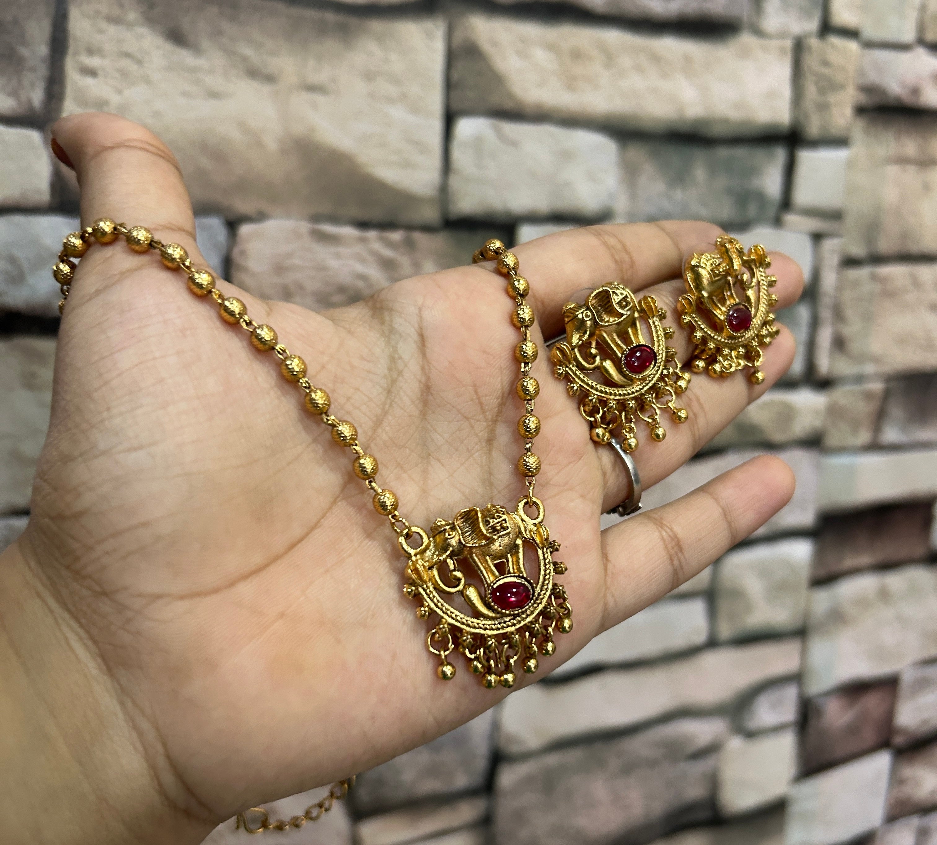 Gold elephant necklace