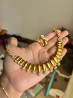 Gold finish diamond set