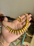 Gold finish diamond set