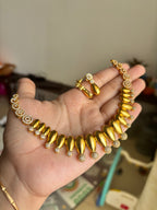 Gold finish diamond set
