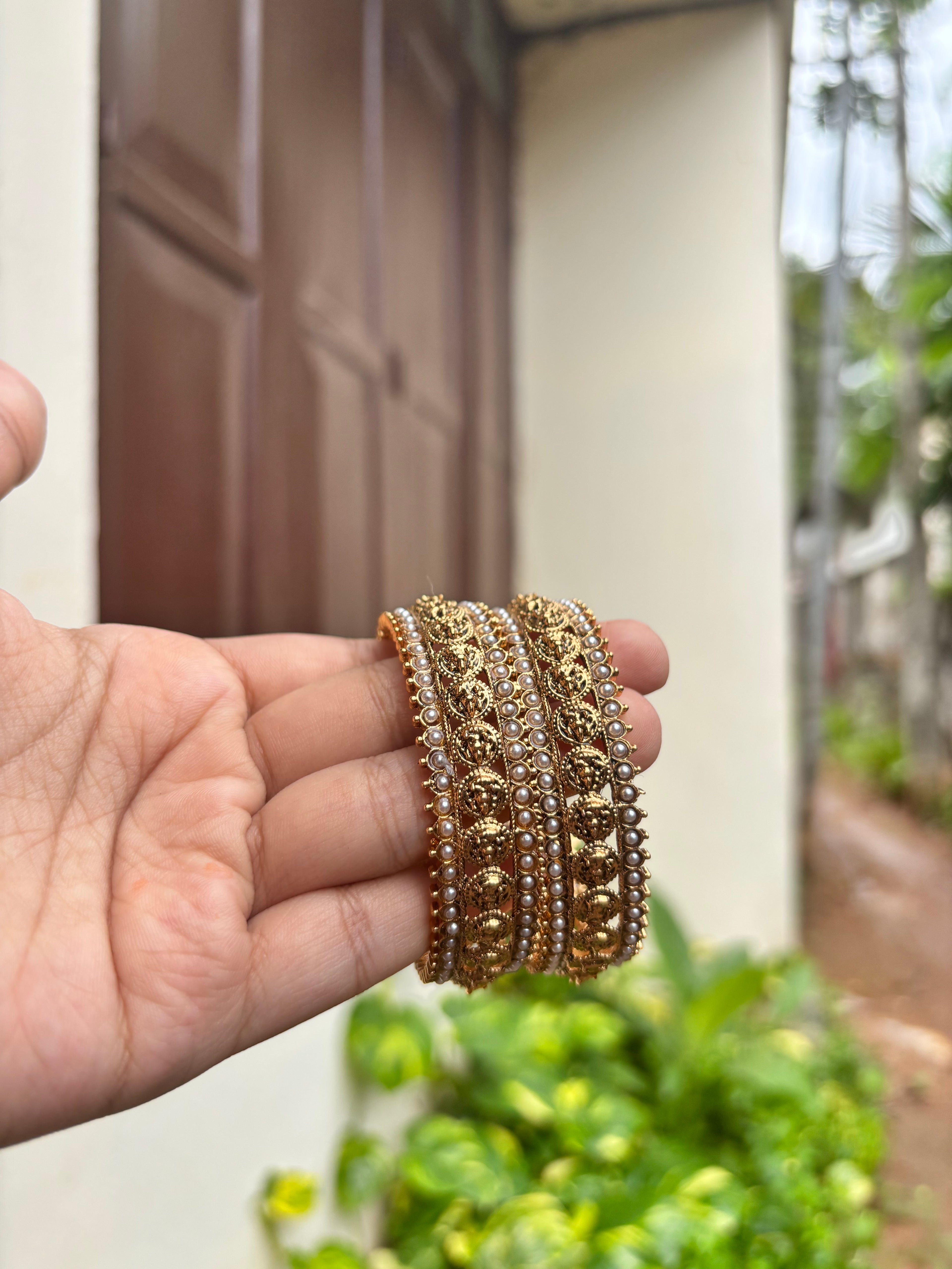 White coin bangles