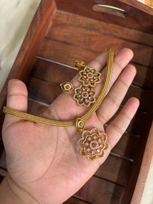 Floral pendent adigai