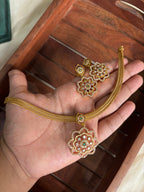 Floral pendent adigai