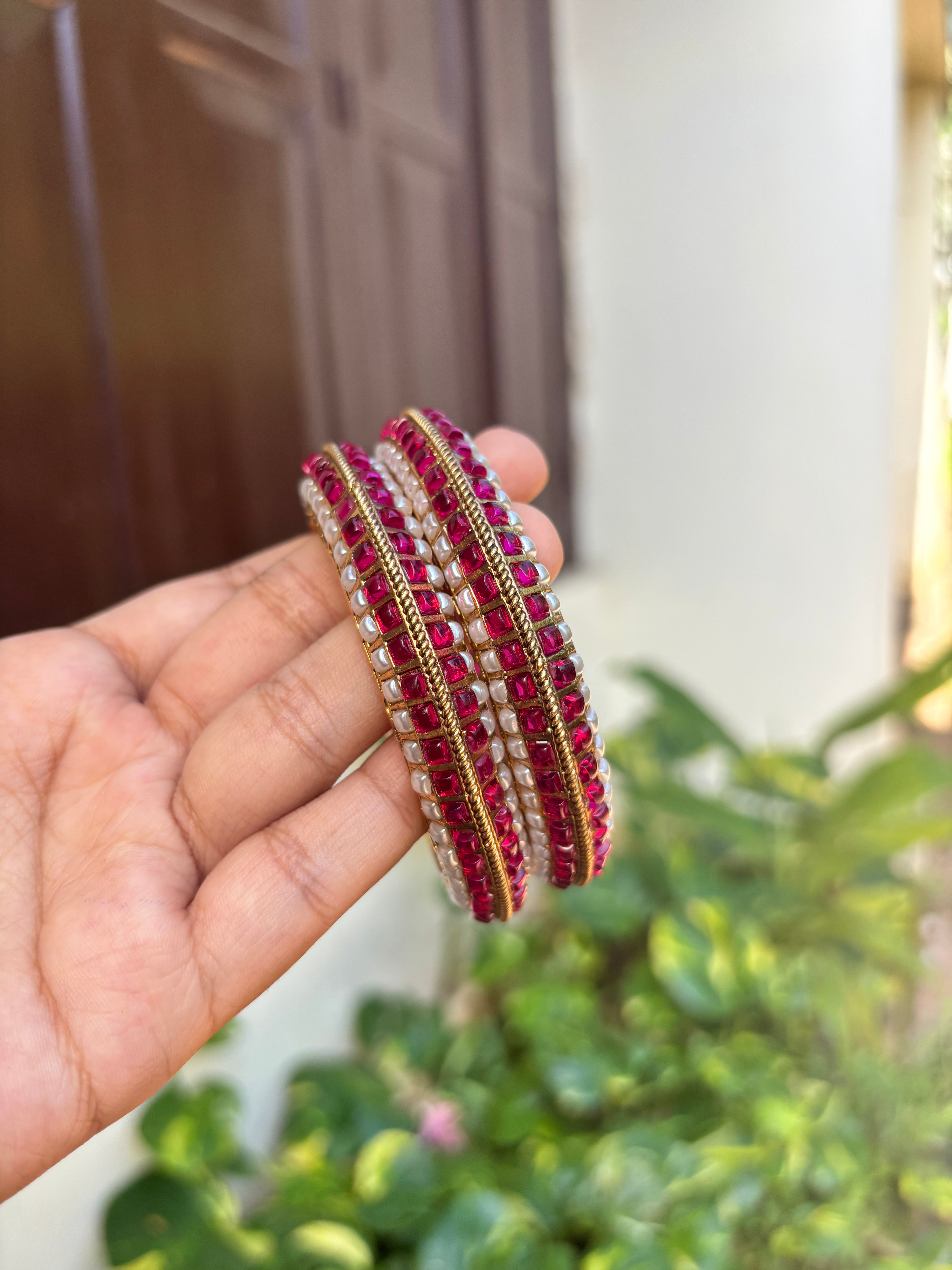 Pink and white bangles