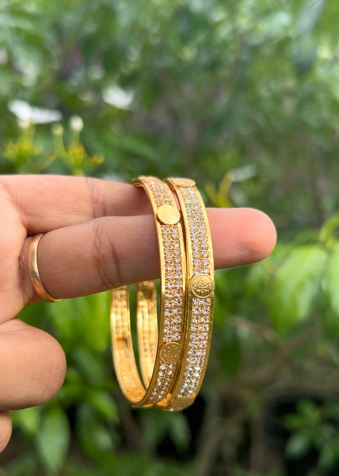 Gold and diamond bangles